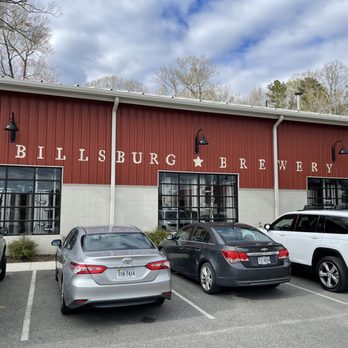 Billsburg Brewery - cars parked in front of the building - Breweries Near Me - Williamsburg, Virginia