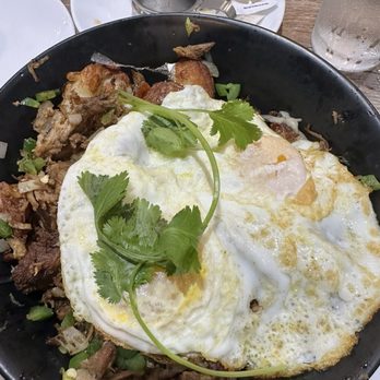 Sweet Cafe - Seasonal Carnitas Skillet Bowl with breakfast potatoes and eggs over medium. - Breakfast & Brunch Near Me - Chicago, Illinois
