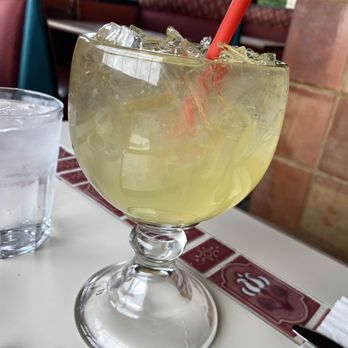 Viva Mexico - a margarita in a glass with a red straw - Mexican Near Me - Seattle, Washington