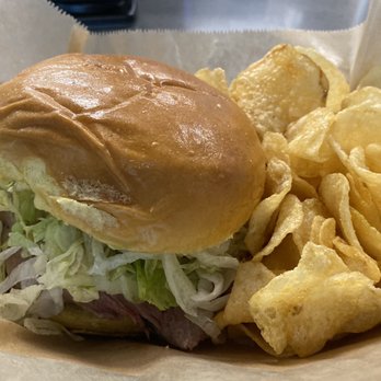 The Carvery - a sandwich and chips in a basket - Barbeque Near Me - Orlando, Florida
