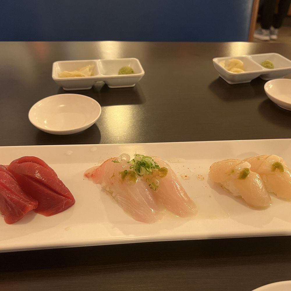 Blue Fin Tuna sushi, Yellowtail sushi, Scallop sushi Blue Fin Tuna sushi, Yellowtail sushi, Scallop sushi