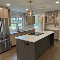 Caliber Custom Cabinetry - Rift White Oak perimeter and painted island with decorative end panels.  Stunning kitchen!!