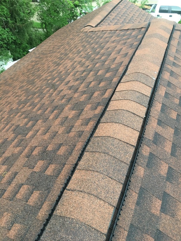 Slide of Humberto's Roofing Service