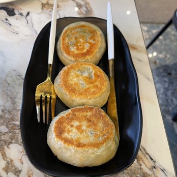 Supreme Dumplings - Pan-Fried Leek Pie (3) - Shanghainese Near Me - Bellevue, Washington Supreme Dumplings - Pan-Fried Leek Pie (3) - Shanghainese Near Me - Bellevue, Washington