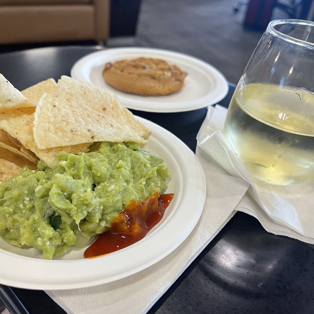 Admirals Club PHX - Complimentary Guac with your choice of additions + House White - Airport Lounges Near Me - Phoenix, Arizona