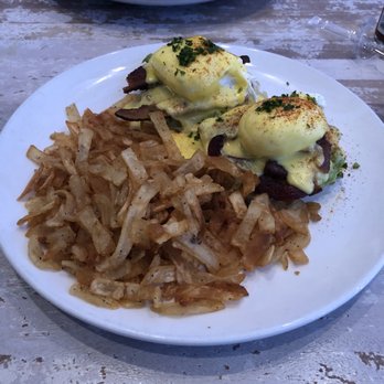 Toast Kitchen & Bar - Bacon Avocado Benedict with Hash Brown Chips $16.00 - Breakfast & Brunch Near Me - Brea, California Toast Kitchen & Bar - Bacon Avocado Benedict with Hash Brown Chips $16.00 - Breakfast & Brunch Near Me - Brea, California