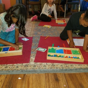 Pear Tree Community School - 1st and 2nd graders studying math. - Elementary Schools Near Me - Oakland, California Pear Tree Community School - 1st and 2nd graders studying math. - Elementary Schools Near Me - Oakland, California