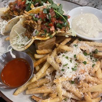 Earls Kitchen + Bar - Chicken tacos w Truffle Fries. - Cocktail Bars Near Me - Plano, Texas