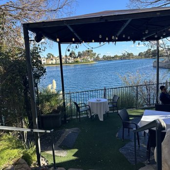 Americana - Patio seating next to water in Desert Shores - New American Near Me - Las Vegas, Nevada Americana - Patio seating next to water in Desert Shores - New American Near Me - Las Vegas, Nevada