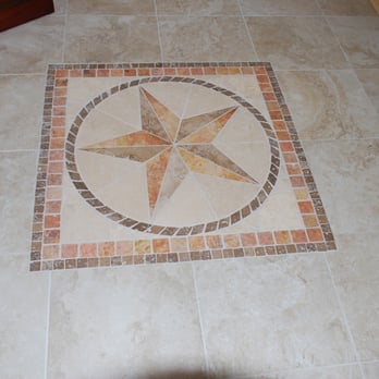Austin's Floor Store - a tile floor with a star in the center - Flooring Near Me - Austin, Texas