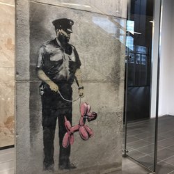 Banksy - Guard With Balloon Dog