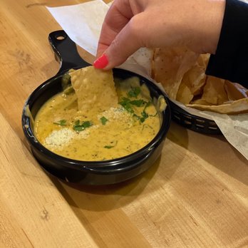 Torchy's Tacos - Chips and queso (without the diablo sauce because I'm still acclimating to Texas' spice levels) - Tex-Mex Near Me - Dallas, Texas