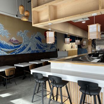 Ramen Akira - a large wave painted on the wall of a restaurant - Ramen Near Me - Suwanee, Georgia