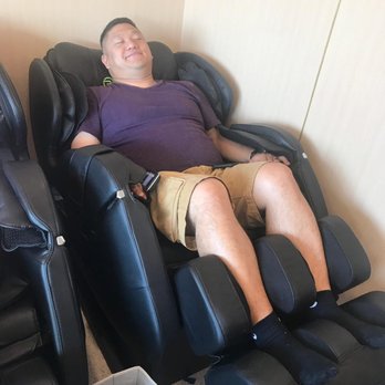 Haidilao Hotpot Flushing - Waiting room for adults, massage chair ten minute limit, hand massage available if that's your thing. This is awesome. - Hot Pot Near Me - Flushing, New York