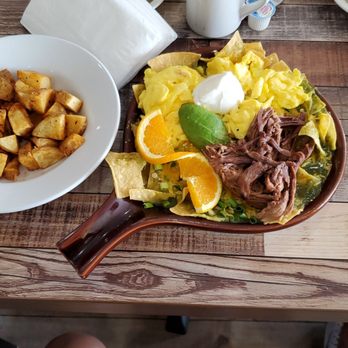 Eggscellent - Chilaquiles con Salsa Verde with Brisket - Breakfast & Brunch Near Me - Las Vegas, Nevada Eggscellent - Chilaquiles con Salsa Verde with Brisket - Breakfast & Brunch Near Me - Las Vegas, Nevada