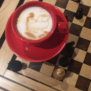 Nerdvana - Here is their vanilla cappuccino with unique latte art! - New American Near Me - Frisco, Texas Nerdvana - Here is their vanilla cappuccino with unique latte art! - New American Near Me - Frisco, Texas