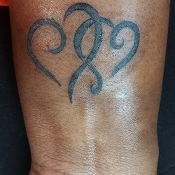 Ink Wizard Tattoos, Inc.