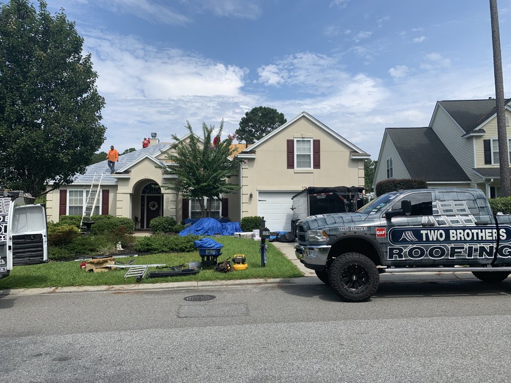 Slide of Two Brothers Roofing