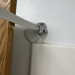 Quality Inn - Bathroom door hits the shower curtain rod so you can't shut the door.
