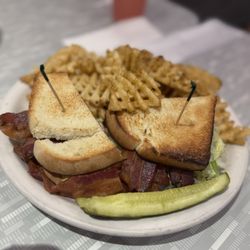 RedEye Diner - BLT sandwich w/ waffle fries and a pickle.