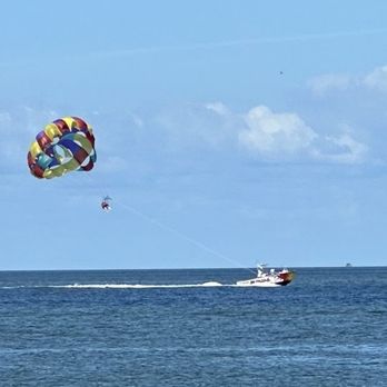 Cedar Island Ferry - A view from the ferry of someone parasailing in the Sound. - Ferries Near Me - Cedar Island, North Carolina Cedar Island Ferry - A view from the ferry of someone parasailing in the Sound. - Ferries Near Me - Cedar Island, North Carolina