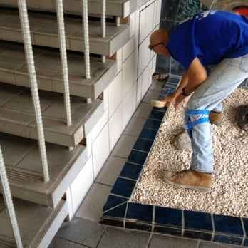 Oahu Building Maintenance - a man working on a stair - Landscaping Near Me - Honolulu, Hawaii Oahu Building Maintenance - a man working on a stair - Landscaping Near Me - Honolulu, Hawaii