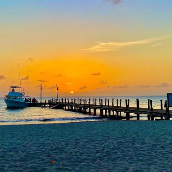 Iberostar Waves Cozumel - The pier at sunset from my chaise - Hotels Near Me - Cozumel, ROO Iberostar Waves Cozumel - The pier at sunset from my chaise - Hotels Near Me - Cozumel, ROO