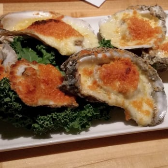 Salt Rock Tavern - Char-grilled oysters. Half dozen available for $5 during special Happy Hour pricing. - New American Near Me - Oldsmar, Florida Salt Rock Tavern - Char-grilled oysters. Half dozen available for $5 during special Happy Hour pricing. - New American Near Me - Oldsmar, Florida
