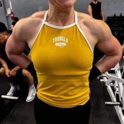 Fitted and Committed  - A photo of my shoulder and upper body muscle gains thanks to Eric's training. I never thought this was possible!
