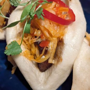 Gather - Pork bun with fresh housemade bao bun, crispy braised pork belly, kimchi, Fresno chiles - New American Near Me - Omaha, Nebraska Gather - Pork bun with fresh housemade bao bun, crispy braised pork belly, kimchi, Fresno chiles - New American Near Me - Omaha, Nebraska