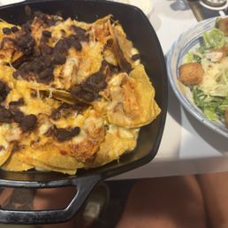 Chicken nachos, Caesar salad.