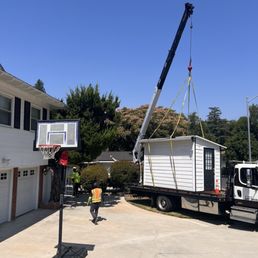 Shed being moved to our side yard Shed being moved to our side yard