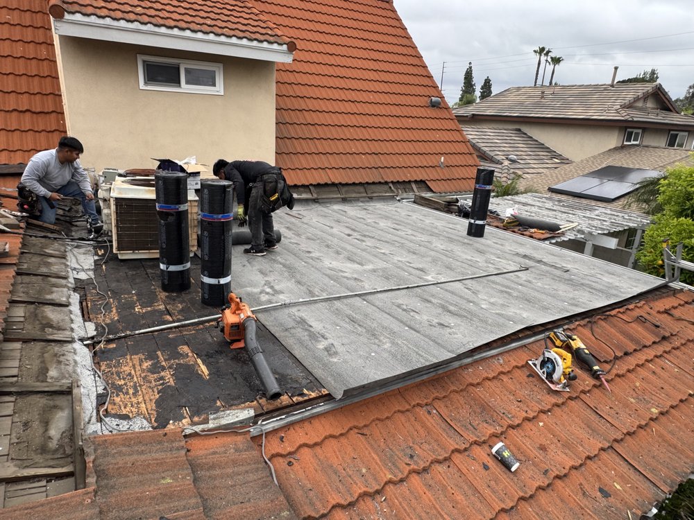 Slide of Aguilar Roofin Repair