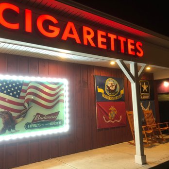 Ace Discount Cigarettes - Pretty neon signs and, of course, our flag! - Tobacco Shops Near Me - Pelham, New Hampshire