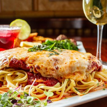 Harbor Crab - a plate of spaghetti and a glass of wine - American Near Me - Patchogue, New York
