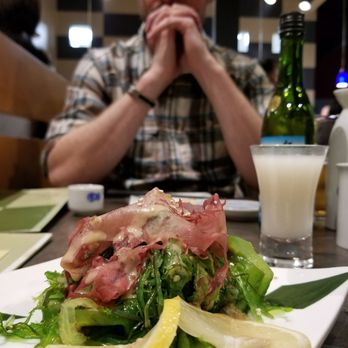 Kirala - Hmmmm seaweed salad..... need I say more? Oh! My sake in the background. Plus my tall glass a water - Sushi Bars Near Me - Berkeley, California