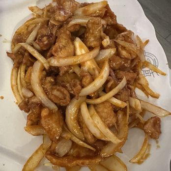 Noodles & Dumplings - Peking Pork Chop: a bit over kill on the onion but zero complaints on the taste or texture.. would absolutely recommend it and order again! - Chinese Near Me - San Antonio, Texas
