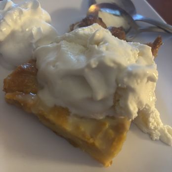 Brockett Pub House & Grill - Peach bread pudding with ice cream and whipped cream - American Near Me - Clarkston, Georgia