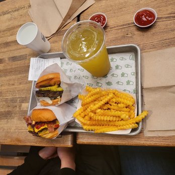 Shake Shack Rice Village - Veggie burger (top) smoke shack (bottom) crinkle cut fries and kiwi lemonade - Burgers Near Me - Houston, Texas Shake Shack Rice Village - Veggie burger (top) smoke shack (bottom) crinkle cut fries and kiwi lemonade - Burgers Near Me - Houston, Texas