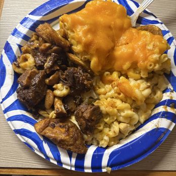 Conduit Jerk Restaurant - $24 medium oxtail plate with 4 small piece of meat plus $5 for Mac and cheese - Seafood Near Me - New York, New York