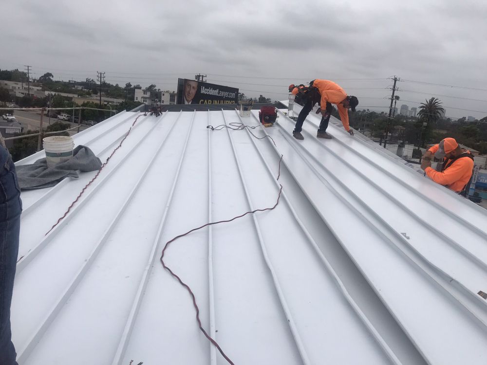 Slide of MA Roofing and Gutters