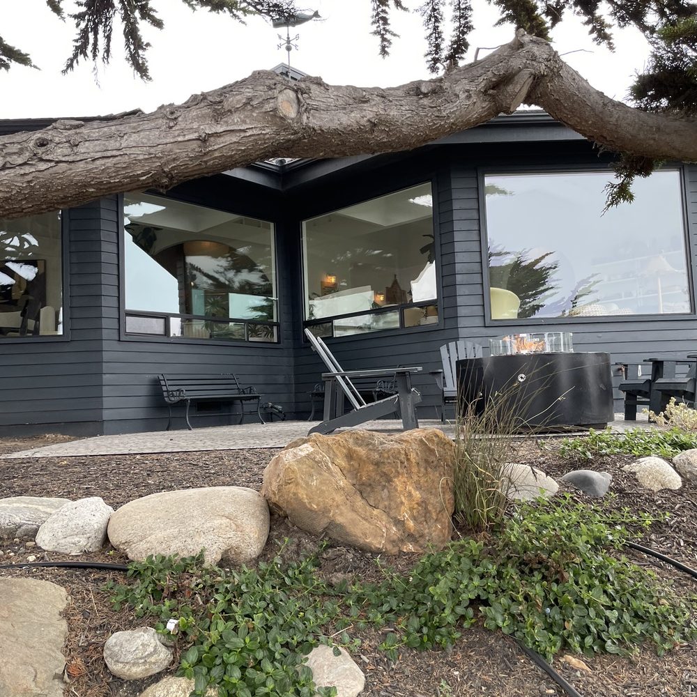 White Water - Main Building (outside) with gas fire pit and seating. - Hotels Near Me - Cambria, California White Water - Main Building (outside) with gas fire pit and seating. - Hotels Near Me - Cambria, California