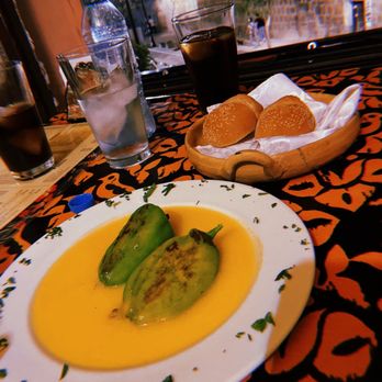El Escapulario - Chiles rellenos con requesón en salsa de naranja. - Mexican Near Me - Oaxaca, OAX El Escapulario - Chiles rellenos con requesón en salsa de naranja. - Mexican Near Me - Oaxaca, OAX