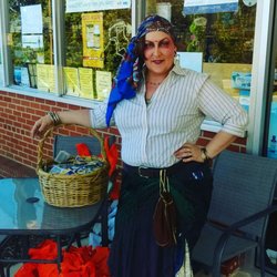 Miss Carey sharing treats from The Good Earth for Leonardtowns Annual Trick or Treat 2016.