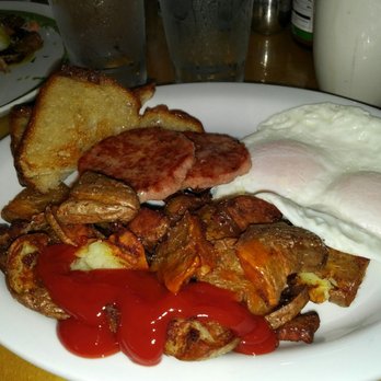 Over Easy - Eggs sausage Fried Potatoes with Sour Dough toast...ketchup and tobacco for the overdone potatoes. - Breakfast & Brunch Near Me - Kailua, Hawaii Over Easy - Eggs sausage Fried Potatoes with Sour Dough toast...ketchup and tobacco for the overdone potatoes. - Breakfast & Brunch Near Me - Kailua, Hawaii