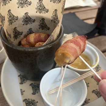 Mr Fogg's Tavern - Pigs in a blanket. Wrapped with perfectly cooked bacon. Sausage was very flavorful and juicy. Hot mustard sauce went great with it! - British Near Me - London, XGL Mr Fogg's Tavern - Pigs in a blanket. Wrapped with perfectly cooked bacon. Sausage was very flavorful and juicy. Hot mustard sauce went great with it! - British Near Me - London, XGL