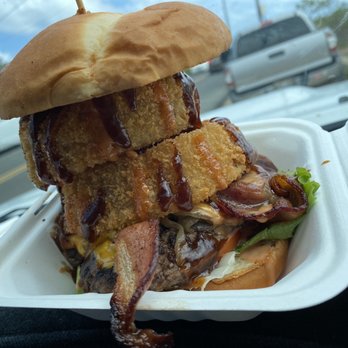 Seven Brothers - Paniolo burger stands tall with very thick onion rings - Burgers Near Me - Laie, Hawaii Seven Brothers - Paniolo burger stands tall with very thick onion rings - Burgers Near Me - Laie, Hawaii