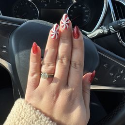 December nails. Builder gel; red with glitter polish and peppermint design. December nails. Builder gel; red with glitter polish and peppermint design.
