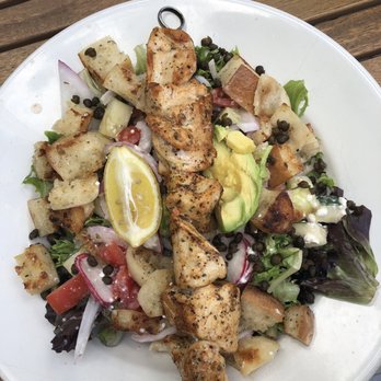 Živio - Fattoush salad and a chicken skewer - Modern European Near Me - Grand Rapids, Michigan Živio - Fattoush salad and a chicken skewer - Modern European Near Me - Grand Rapids, Michigan