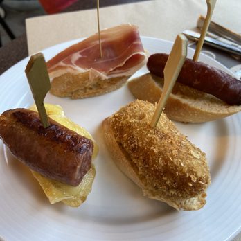 Bilbao Berria - Tapas: sausage w/brie, iberico and tomato, sausage and caramelized onions, ham croquette - Spanish Near Me - Barcelona, B